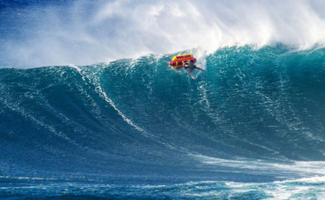 Tune In Thursdays: Ian Walsh Surfs Jaws On An Inflatable Hot Dog