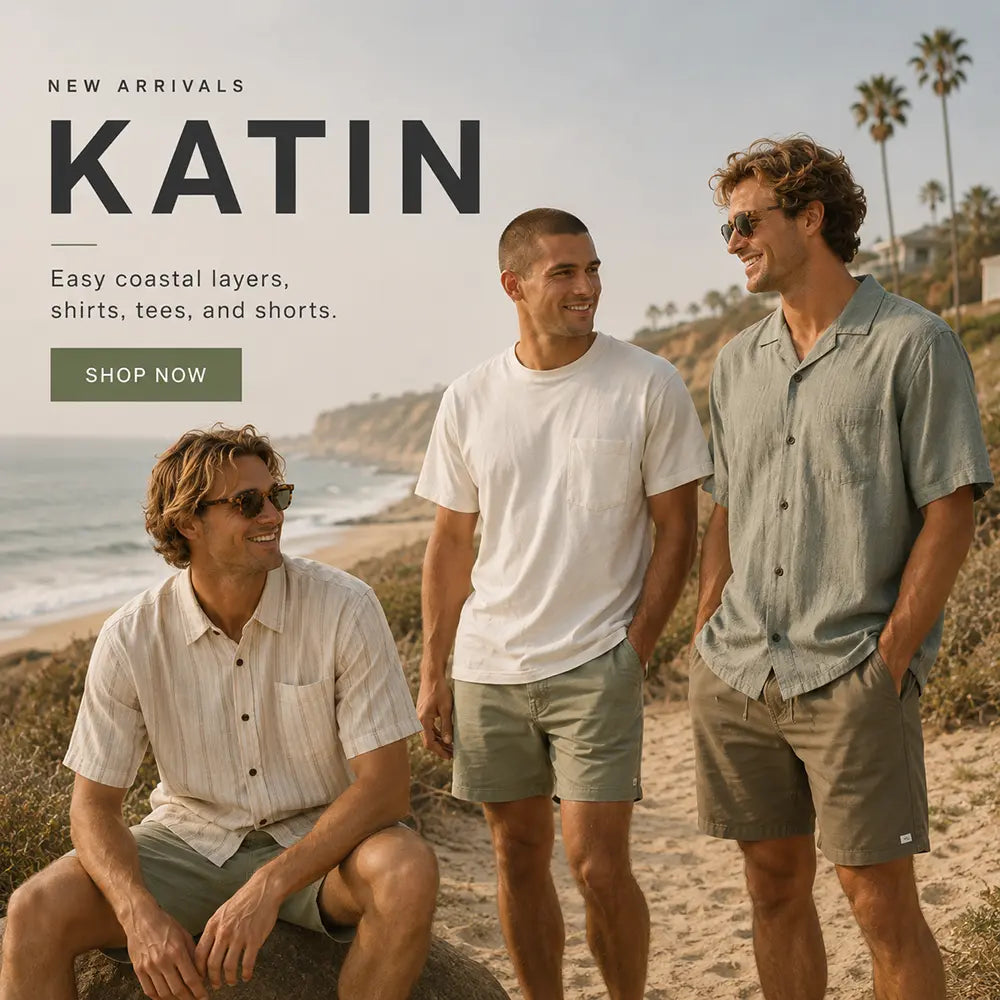 Three men wearing Katin coastal casual apparel are posed on a sandy beach with the ocean and palm trees in the background. The image includes promotional text reading 'NEW ARRIVALS KATIN' with a 'SHOP NOW' button.
