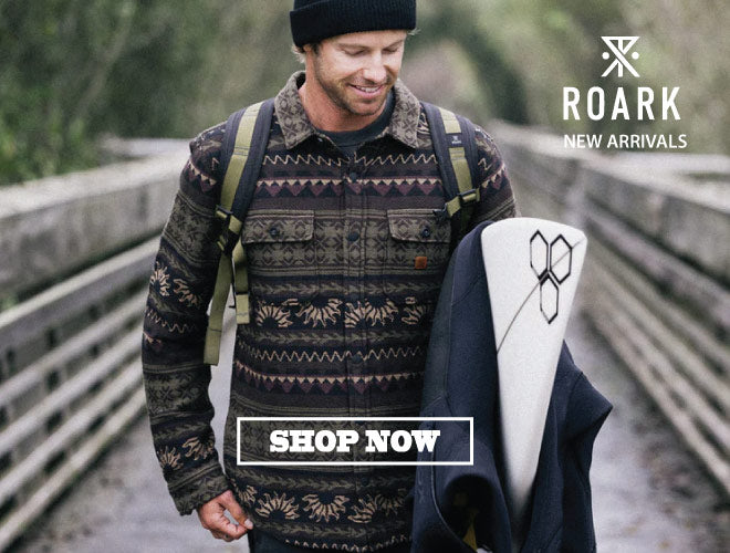 Surfer wearing Roark Holiday Flannel
