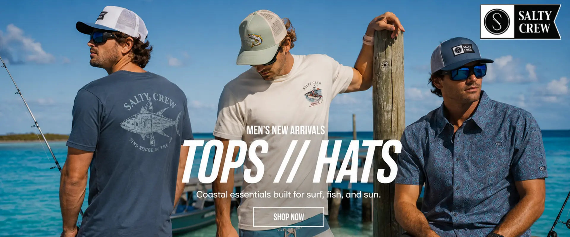 Three men wearing Salty Crew tops and hats stand on a boat deck with ocean water and blue sky in the background. Large text reads 'TOPS // HATS' with smaller 'MEN'S NEW ARRIVALS' and 'Coastal essentials built for surf, fish, and sun.