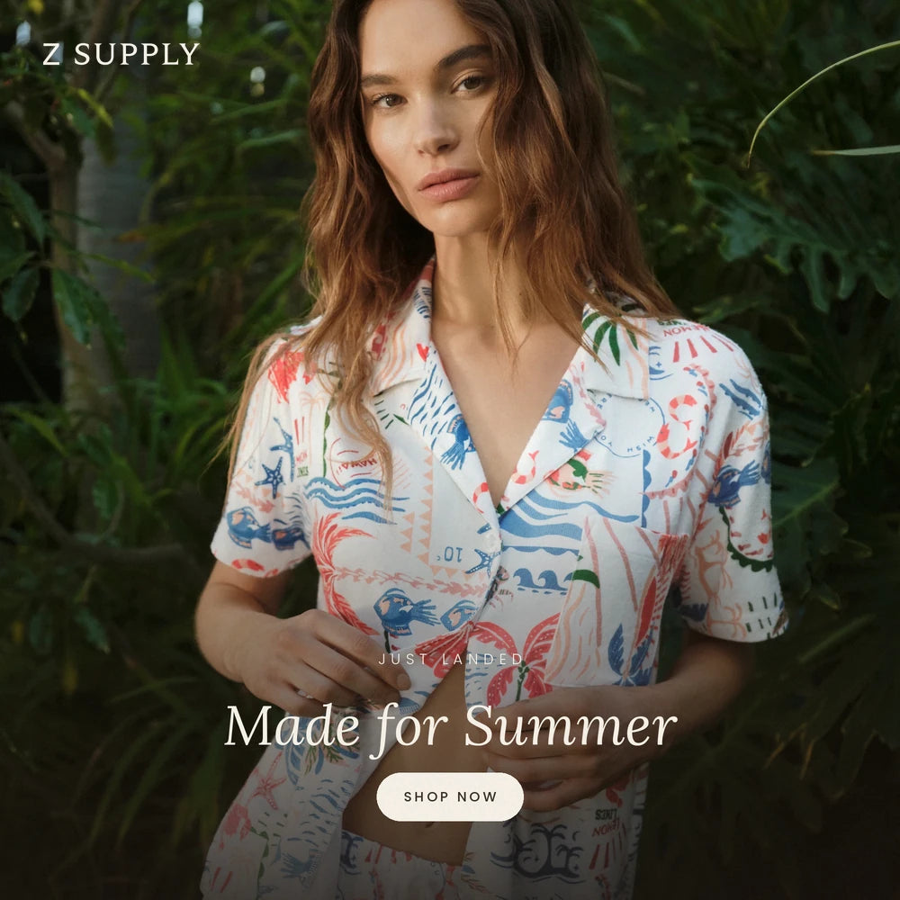 Woman wearing a colorful patterned shirt with 'Z Supply' branding and 'Made for Summer' text.